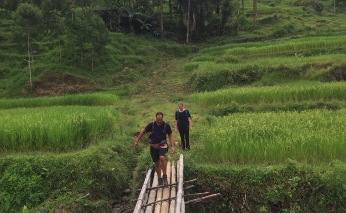Crossing Bamboo Bridge during Toraja Trekking