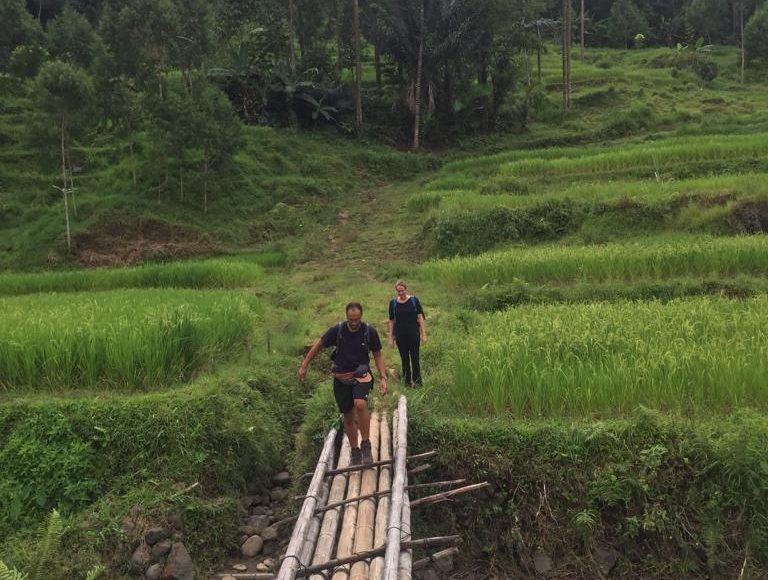 Crossing Bamboo Bridge during Toraja Trekking